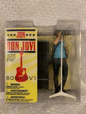 Jon Bon Jovi Collectible Figure with Microphone Stand and guitar. New in box.